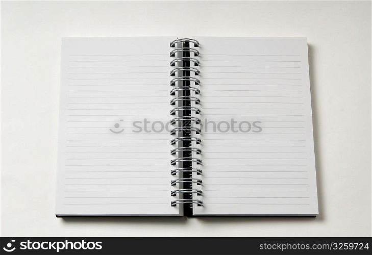 Opened blank coil note pad.