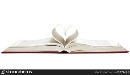 Opened book with heart isolated on white, studio shot
