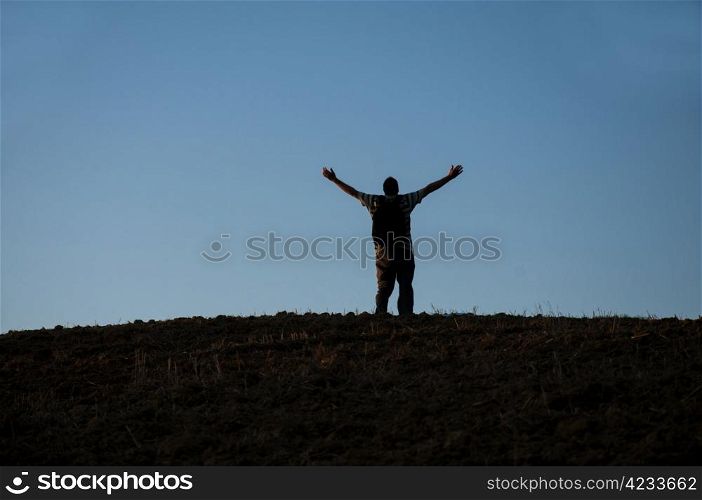 opened his hands standing at the summit of human