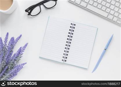 opened notebook near lavender keyboard glasses desk . Resolution and high quality beautiful photo. opened notebook near lavender keyboard glasses desk . High quality and resolution beautiful photo concept