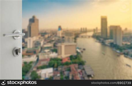 opened white door to bangkok city skyline along chaophraya river at sunset