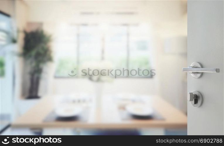 opened white door to modern dining room interior
