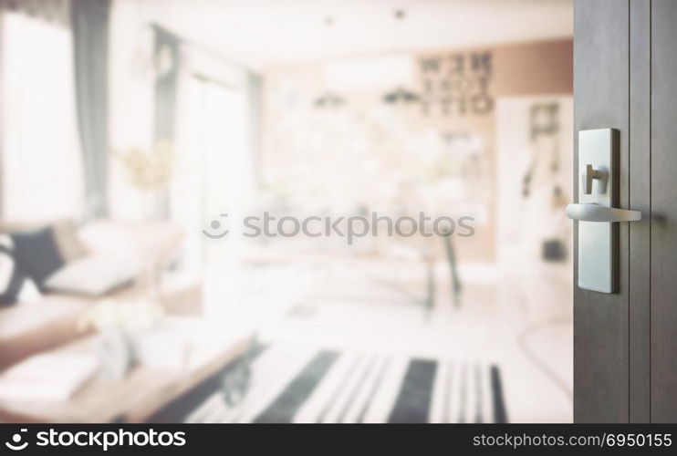 opened wooden door to modern living corner next to the dining room