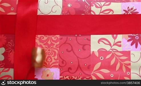 Opening Red Christmas Gift