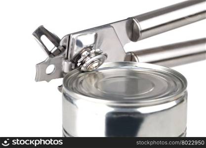 Opening tin can. Tin opener opening a can