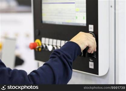 operator controls the work of the CNC machine