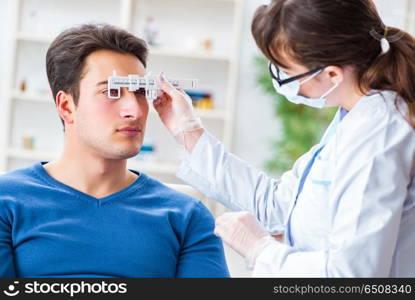 Ophthalmologist is checking up patient in eye doctor hospital