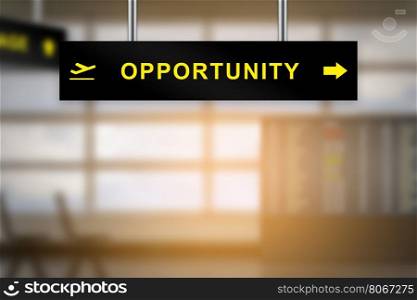 Opportunity on airport sign board with blurred background and copy space