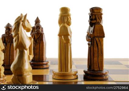 opposition two chess king. The placed party from chessmen. Figures - from a tree, manual work