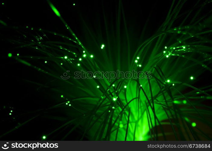 Optical fibers of fiber optic cable. Internet technology. Green color