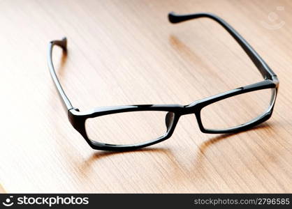 Optical reading glasses on the background