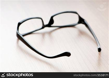 Optical reading glasses on the background