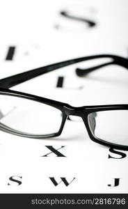 Optical reading glasses on the eyesight table