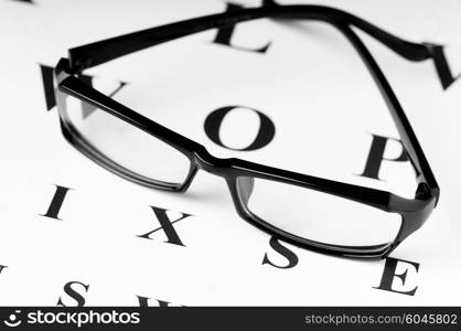 Optical reading glasses on the eyesight table