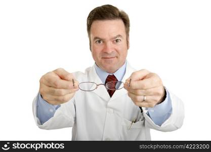 Optician holding out a new pair of reading glasses toward you. Isolated on white.