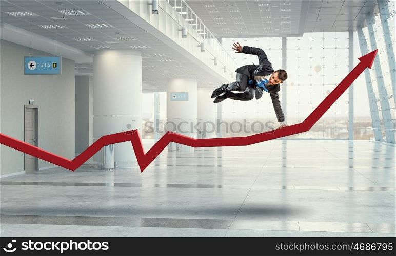 Optimistic dancing businessman. Happy businessman perform success dancing on arrow graph. Mixed media