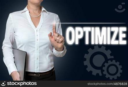 optimize touchscreen is operated by businesswoman. optimize touchscreen is operated by businesswoman.