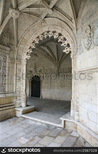 Oranate arched doorway in Jeronimos Monastery in Lisbon, Portugal.