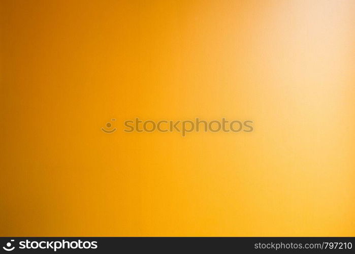 Orange abstract gold background yellow color, light corner spotlight, faint orange vintage background. Colorful beauty. Orange abstract gold background yellow color, light corner spotlight, faint orange vintage background. Colorful