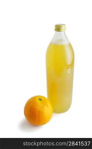 Orange and a bottle of apple juice