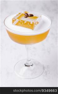 Orange and coffee cocktail in elegant glass