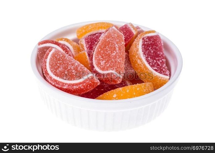 Orange and grapefruit jujube on white. Studio Photo. Orange and grapefruit jujube on white