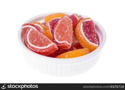 Orange and grapefruit jujube on white. Studio Photo. Orange and grapefruit jujube on white