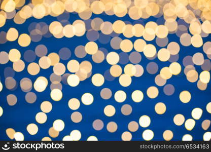 Orange and yellow blur holiday lights can be used for background. Orange and yellow blur holiday lights