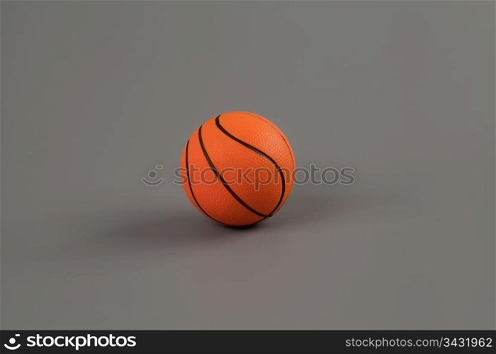 Orange basketball isolated on the grey