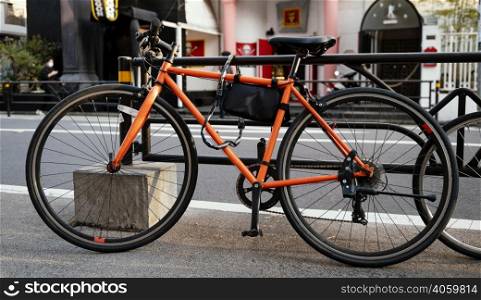 orange bicycle outdoors