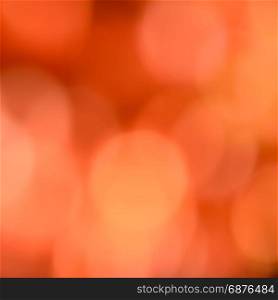 Orange bokeh abstract background of de-focused Christmas lights
