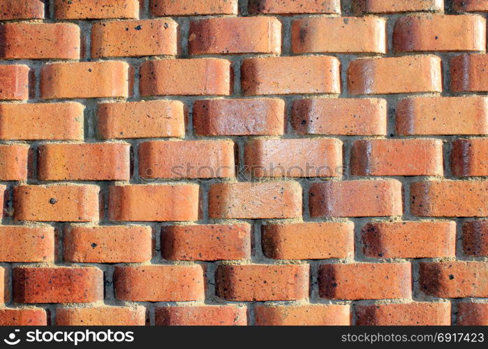 Orange brick wall. Solid. Orange brick wall. Solid old vintage textured background
