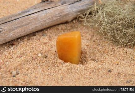 Orange calcite on beach