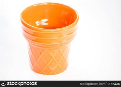 Orange ceramic plant pot isolated on white background