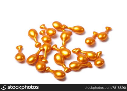 orange cosmetic capsules isolated