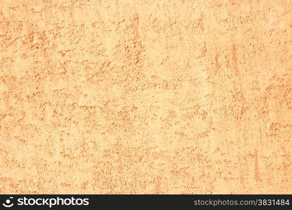 Orange decorative stucco texture. Orange plaster background.