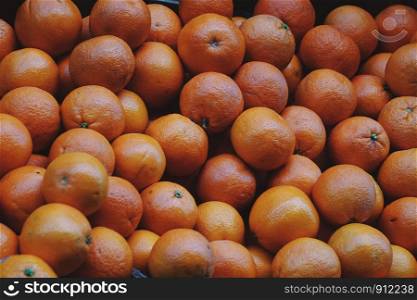 orange fruit in the market, healthy food and tasty fruit