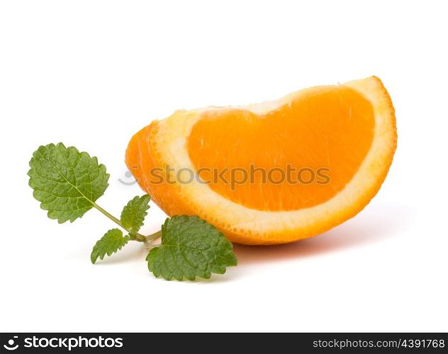 Orange fruit segment and citron mint leaf isolated on white background