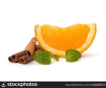 Orange fruit segment, cinnamon sticks and mint isolated on white background. Hot drinks ingredients.