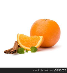 Orange fruit segment, cinnamon sticks and mint isolated on white background. Hot drinks ingredients.