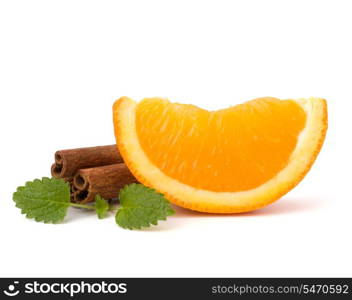 Orange fruit segment, cinnamon sticks and mint isolated on white background. Hot drinks ingredients.