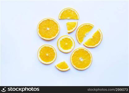 Orange fruit slices on white background.