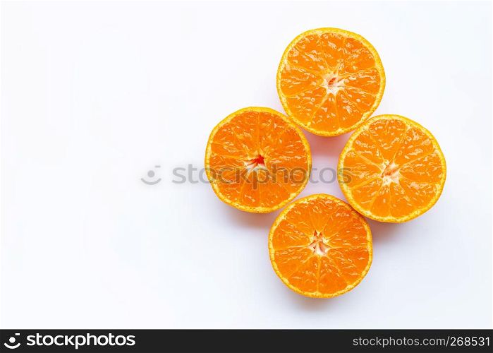 Orange fruits on a white background. Copy space