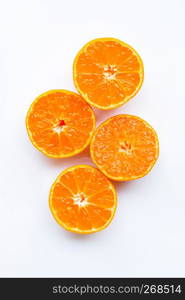 Orange fruits on a white background. Top view