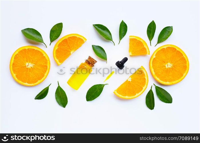 Orange fruits with citrus oil. Natural vitamin C on white background. Top view