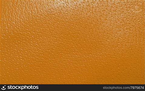 Orange genuine leather background