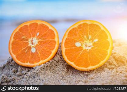 Orange is on beach sea view background,Summer holiday concept