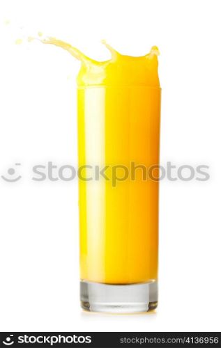 orange juice is splashing in glass cut out from white background