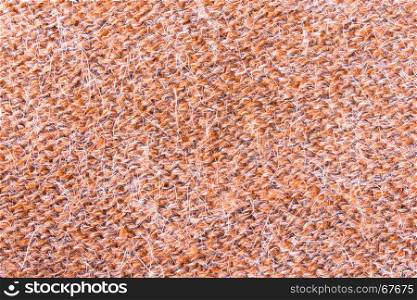 Orange knitting fabric texture background or knitted pattern background for design. Knitting or knitted