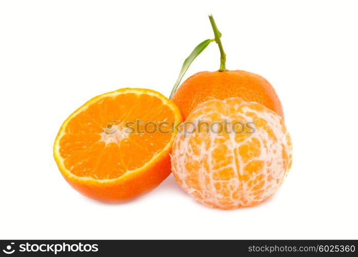 Orange mandarins with green leaf isolated on white background